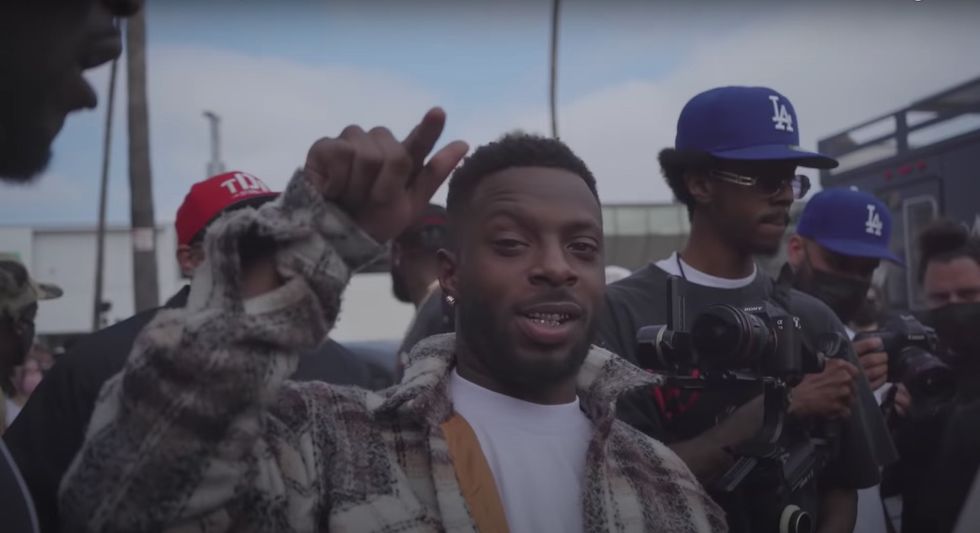 Isaiah Rashad in the new video for his Kenny Beats-produced loosie, "200/Warning"