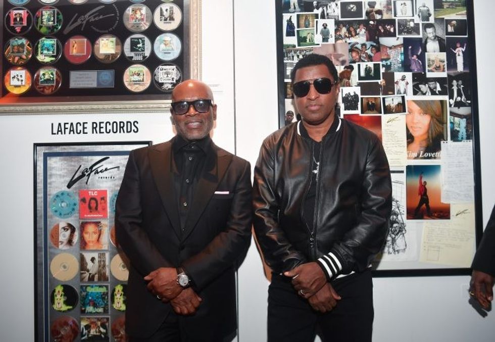 Singer Babyface wearing all Black standing next to L.A. Reid wearing all Black.