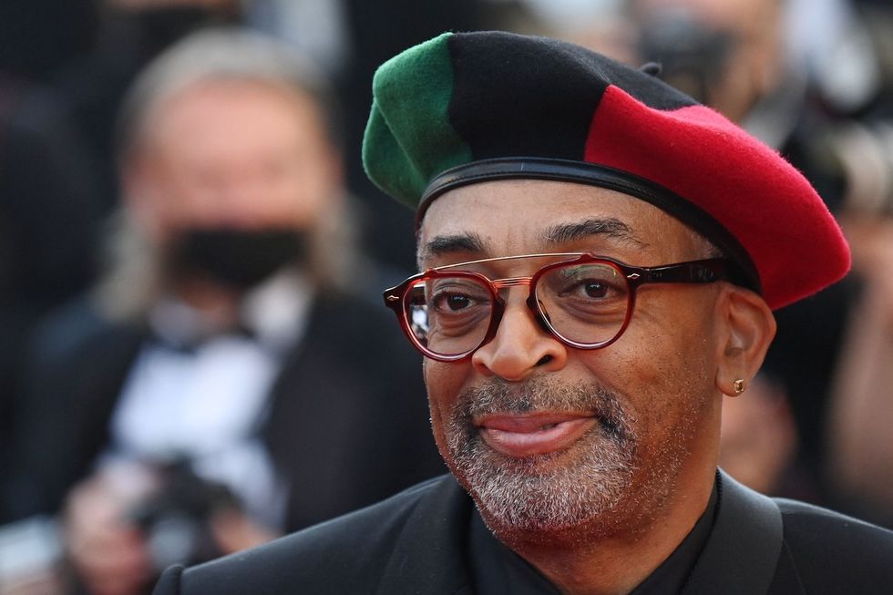 Spike Lee wearing colorful hat